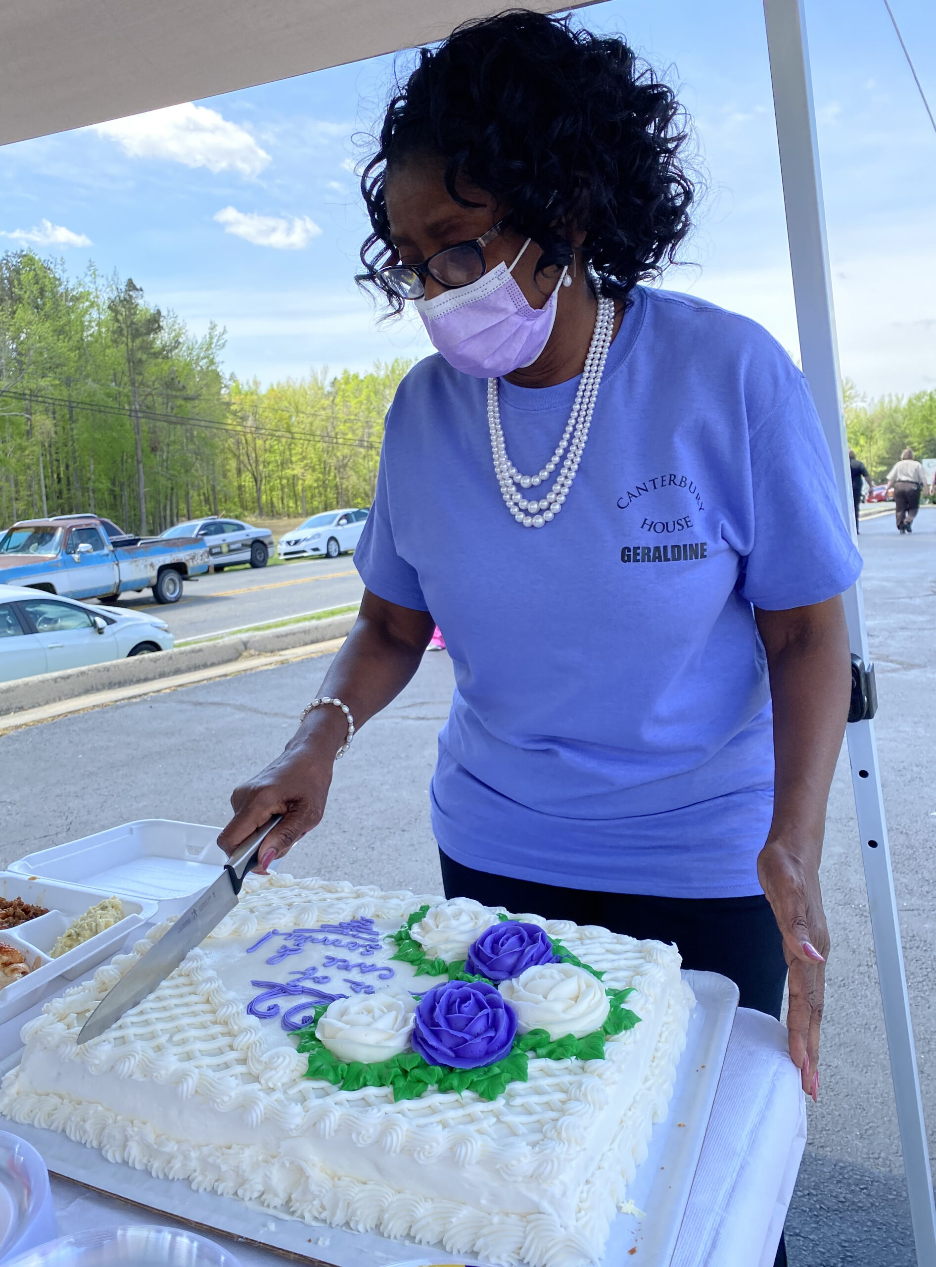 Canterbury House Executive Director, Geraldine Yancey, cuts the cake for the community’s 22nd Anniversary. The Assisted Living Community held their celebration on Tuesday, April 13.